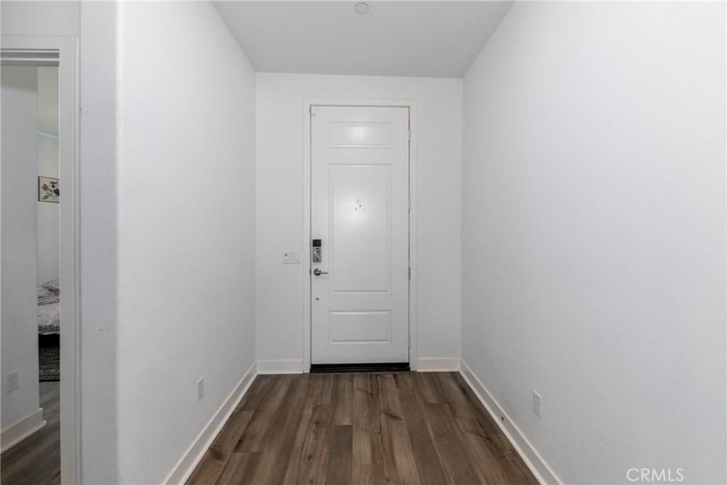 1740 Boysen Way Beaumont, CA 92223 - Photo 8 of 49 a view of a small space with wooden floor