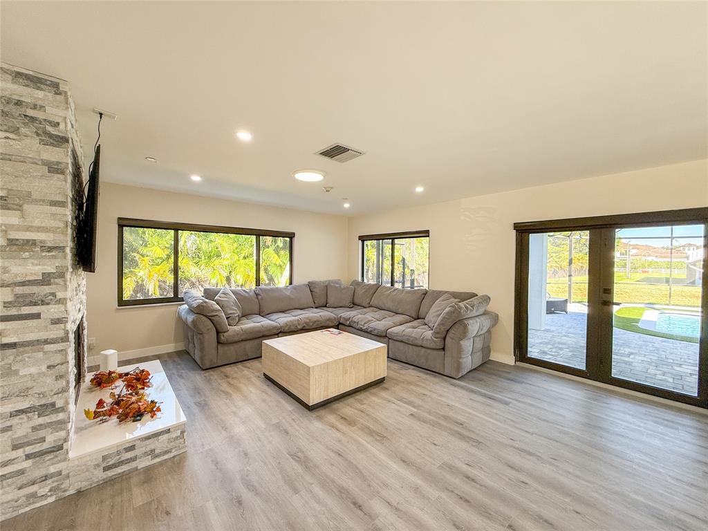 5790 Melaleuca Road Southwest Ranches, FL 33330 - Photo 17 of 44 a living room with furniture and a large window