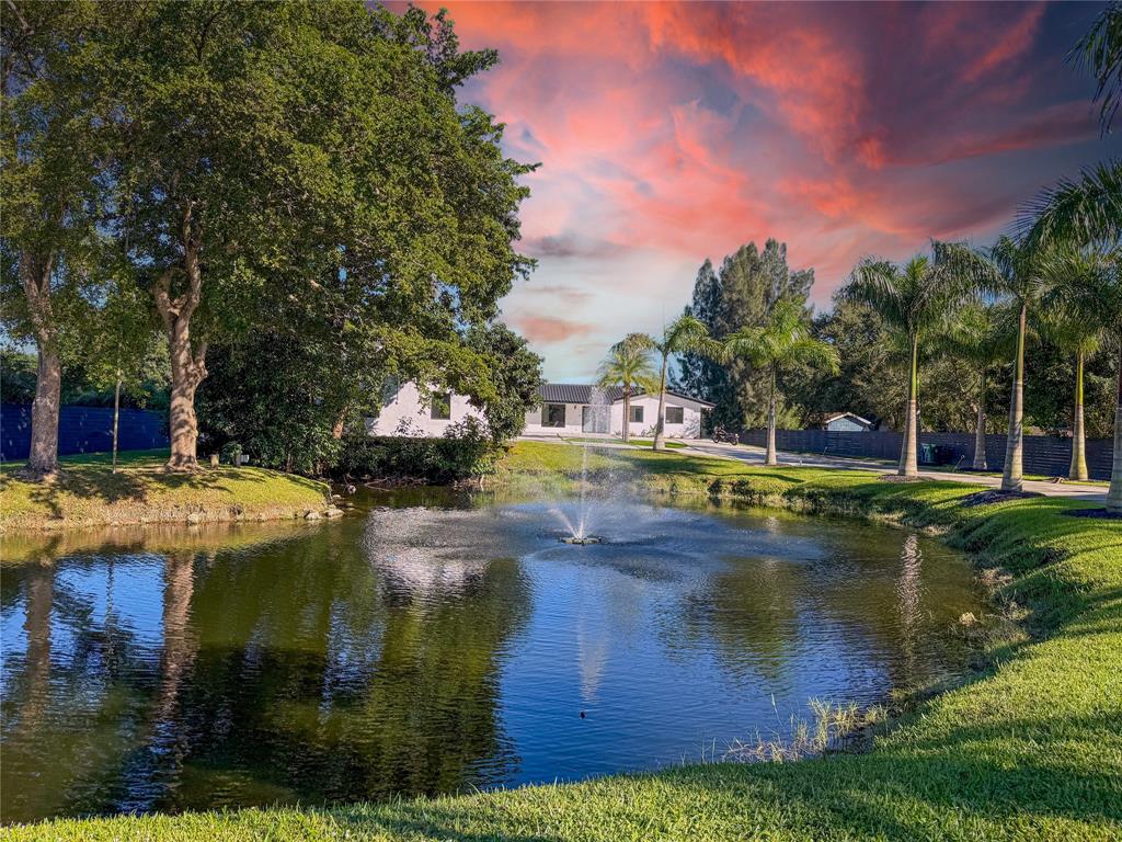 5790 Melaleuca Road Southwest Ranches, FL 33330 - Photo 2 of 44 a view of a swimming pool with an outdoor space