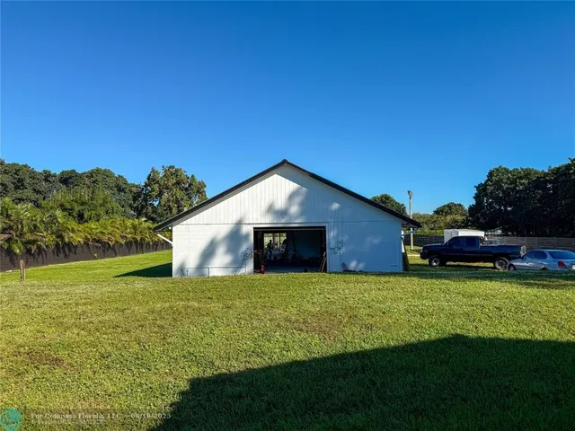 a house view with a garden space