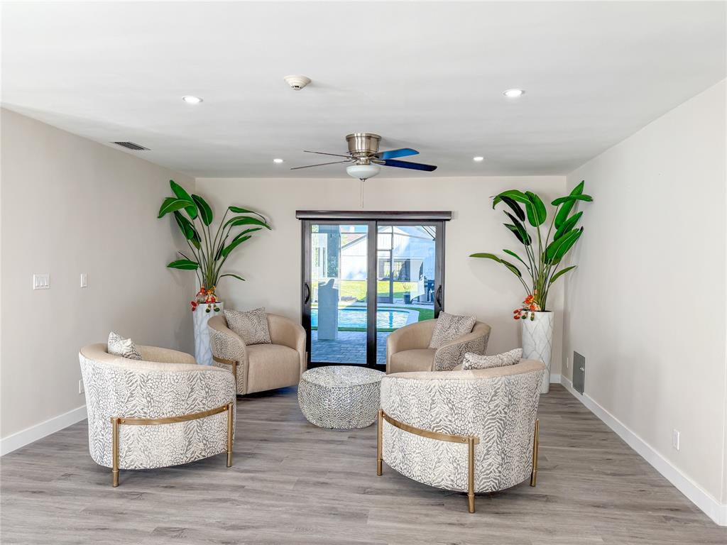 5790 Melaleuca Road Southwest Ranches, FL 33330 - Photo 8 of 44 a living room with furniture and a potted plant