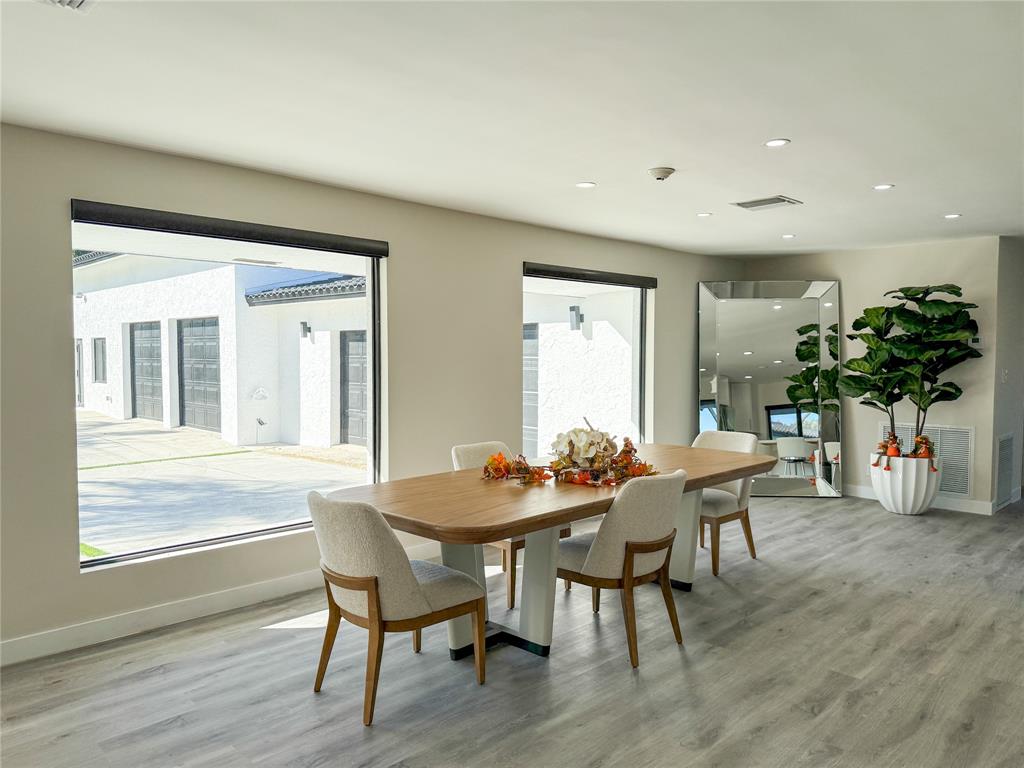 5790 Melaleuca Road Southwest Ranches, FL 33330 - Photo 10 of 44 a dining room with furniture and wooden floor