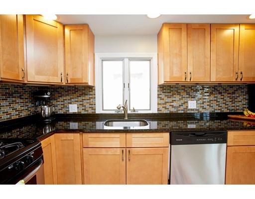 26 Hallron Street Boston, MA 02136 - Photo 12 of 21 a kitchen with sink a window and cabinets
