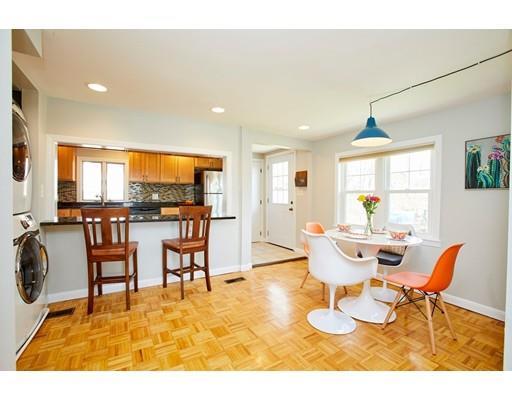 26 Hallron Street Boston, MA 02136 - Photo 13 of 21 a living room with furniture a flat screen tv and a large window