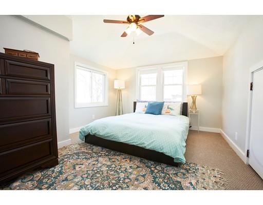 26 Hallron Street Boston, MA 02136 - Photo 15 of 21 a bedroom with a bed and a closet