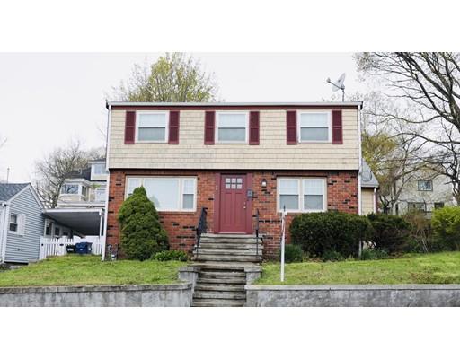 26 Hallron Street Boston, MA 02136 - Photo 21 of 21 a front view of a house with a yard and garage