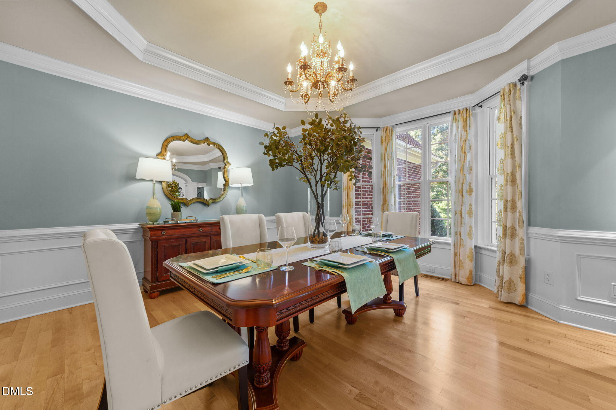 3901 Orchard Point Court Apex, NC 27539 - Photo 8 of 53 a view of a dining room with furniture window and wooden floor