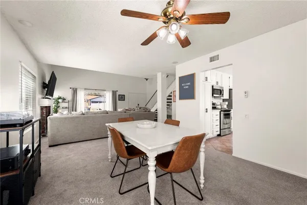 a kitchen with sink cabinets and window