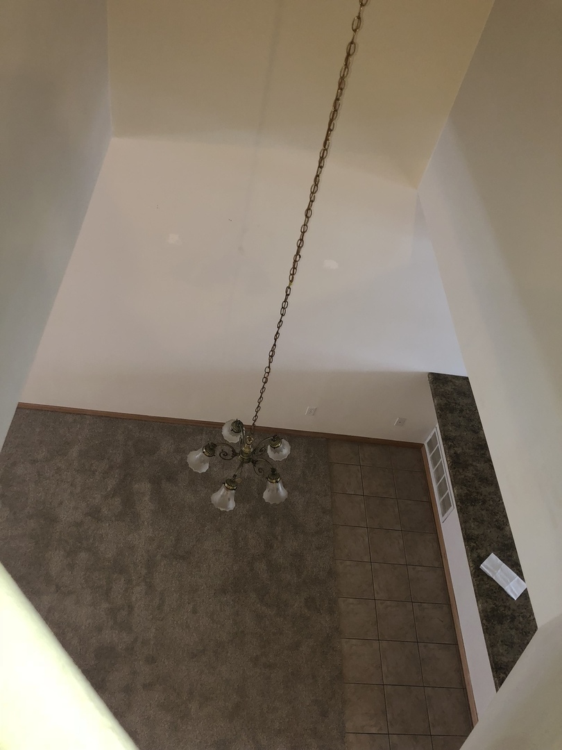 6032 Park Ridge Road, Unit 6032 Loves Park, IL 61111 - Photo 11 of 13 a view of wooden floor