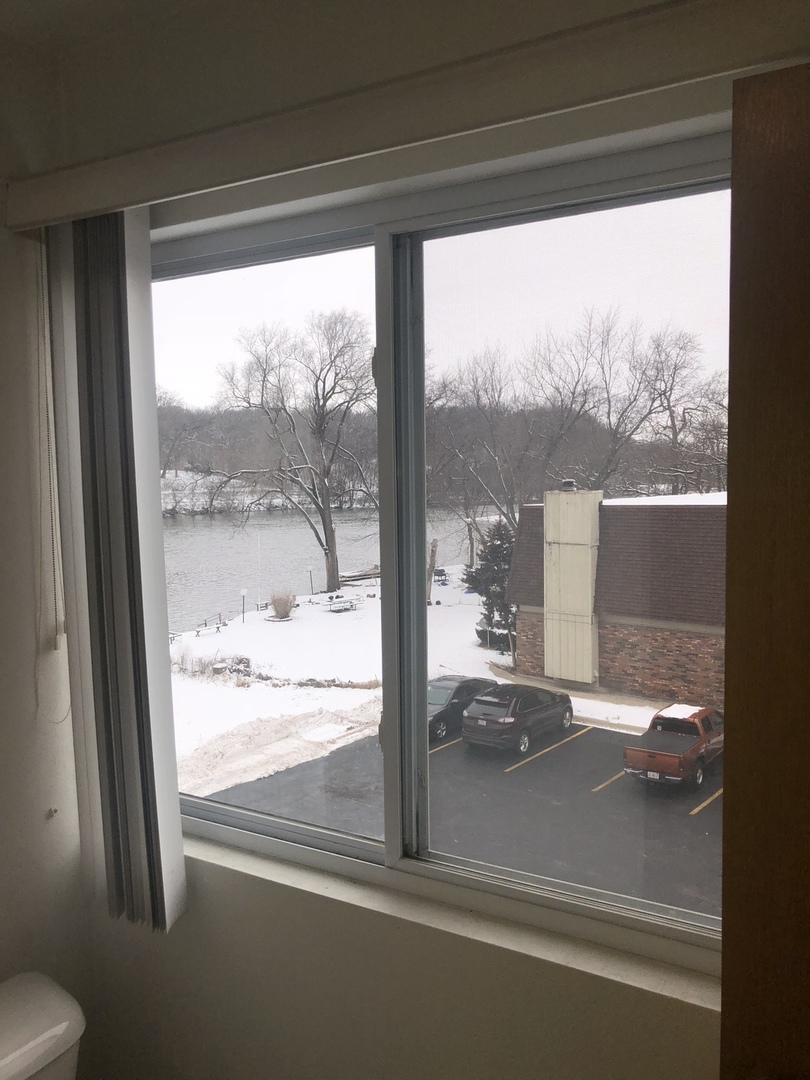 6032 Park Ridge Road, Unit 6032 Loves Park, IL 61111 - Photo 5 of 13 a view of a room and a window