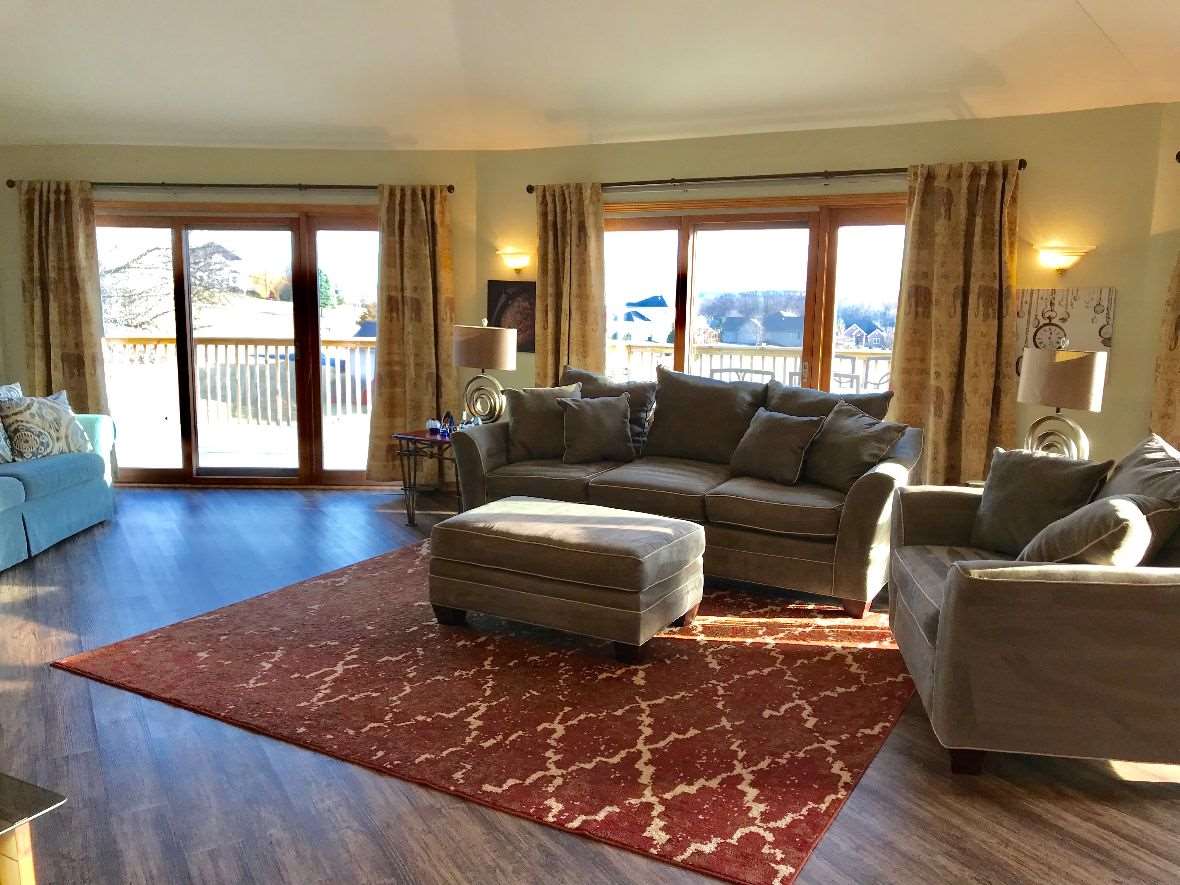 9289 North Barker Road Byron, IL 61010 - Photo 4 of 25 a living room with furniture and a large window