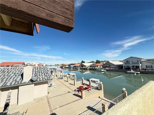 a view of a balcony with an ocean view