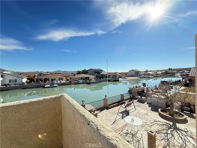 a view of a lake with a house