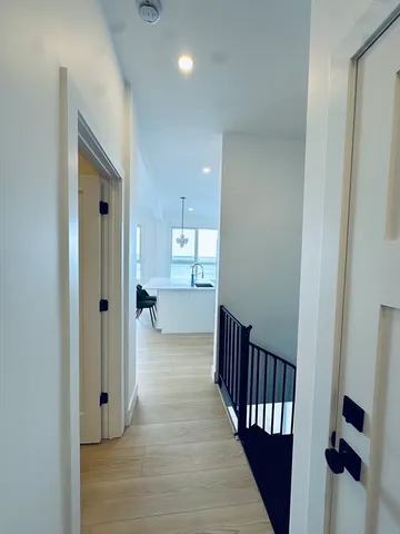 a view of entryway with wooden floor