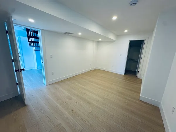 a view of an empty walk in closet