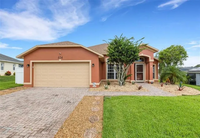 a front view of a house with patio