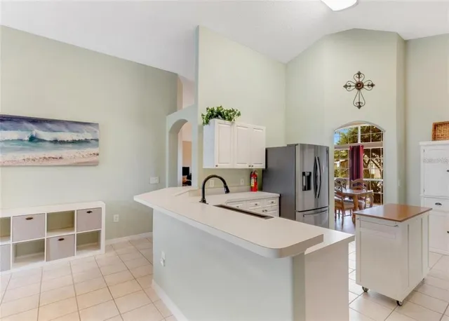 a room with table and chairs