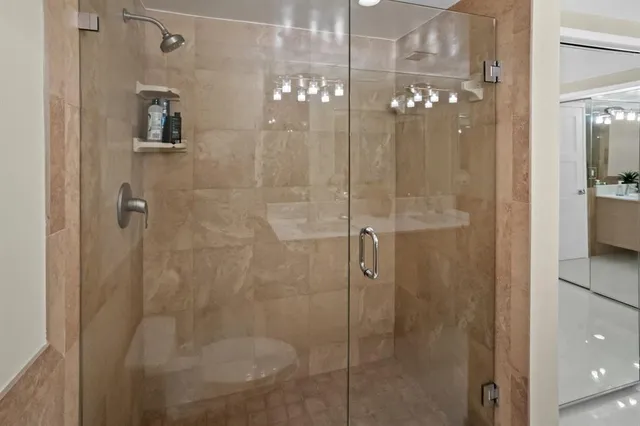 a lobby with furniture and potted plant