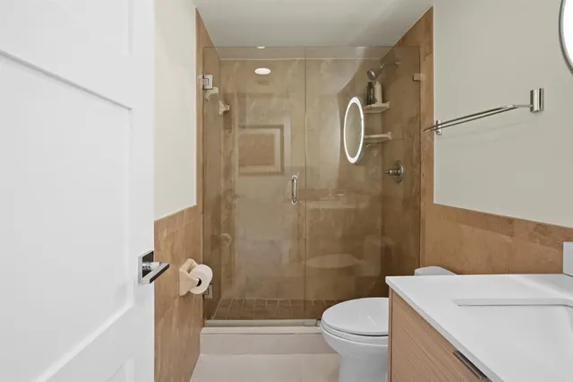 a view of terrace with lawn chairs