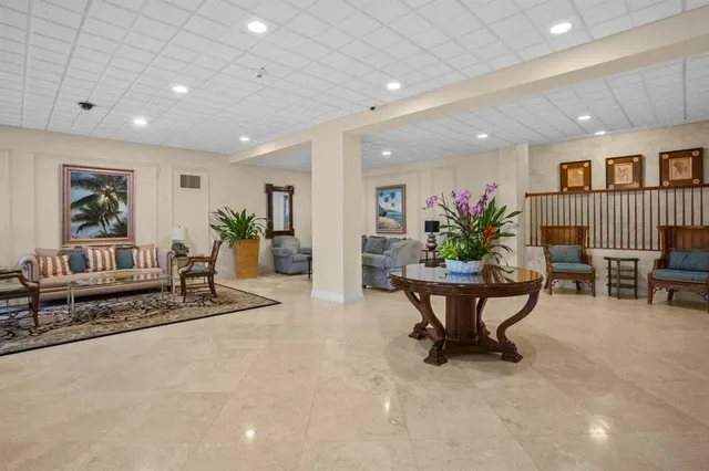 a group of people sitting in a living room