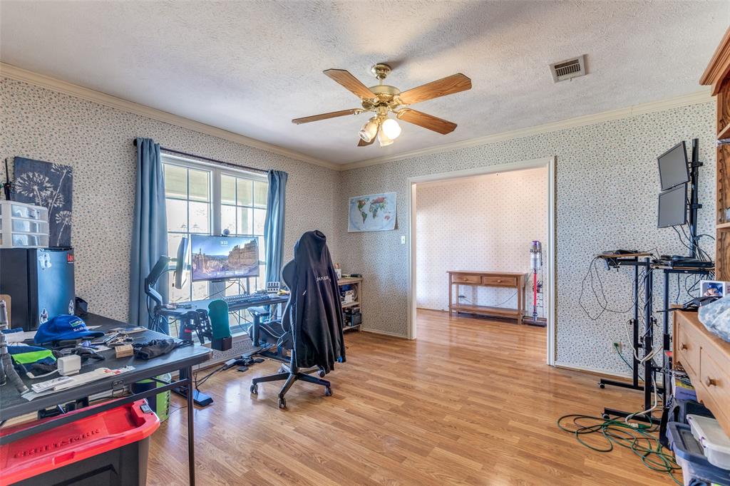 453 County Road 371 Anna, TX 75409 - Photo 18 of 26 a view of a room with gym equipment