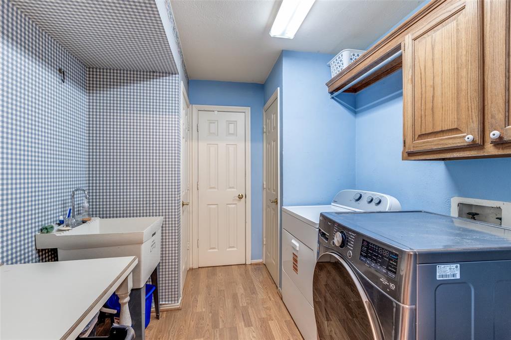 453 County Road 371 Anna, TX 75409 - Photo 20 of 26 a utility room with dryer and washer