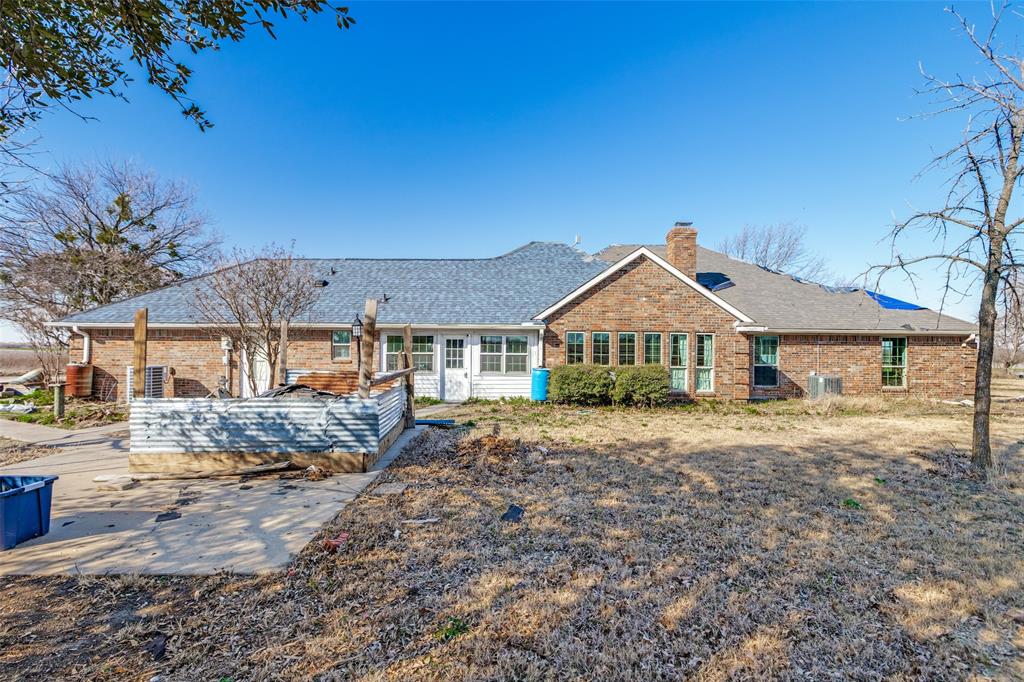 453 County Road 371 Anna, TX 75409 - Photo 25 of 26 a front view of a house with a yard