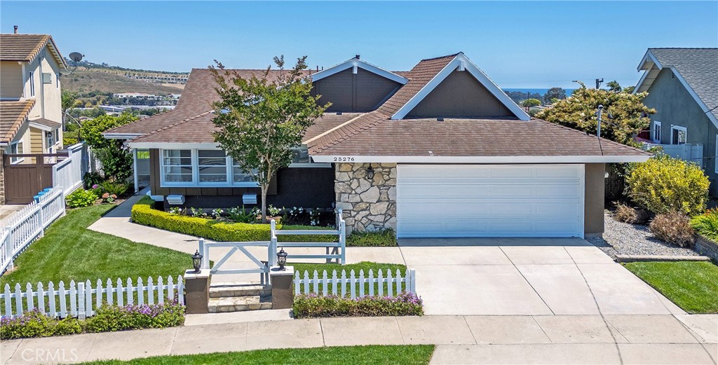 25276 Barque Way Dana Point, CA 92629 - Photo 3 of 61 a front view of a house with garden