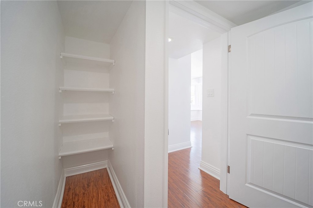 25276 Barque Way Dana Point, CA 92629 - Photo 33 of 61 a view of walk in closet with wooden floor