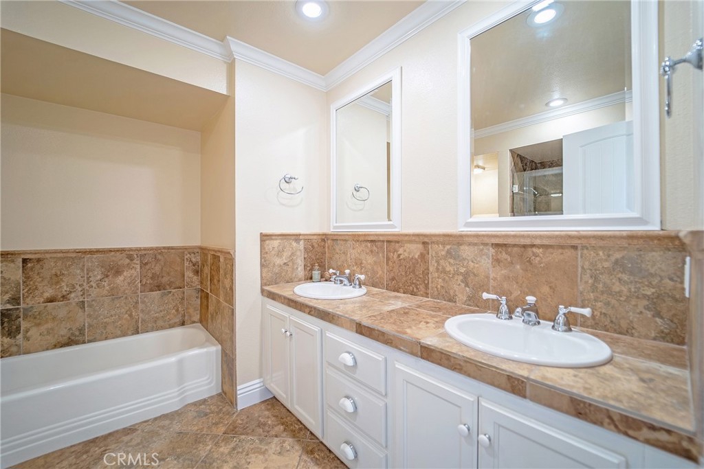 25276 Barque Way Dana Point, CA 92629 - Photo 44 of 61 a bathroom with a sink and a bathtub