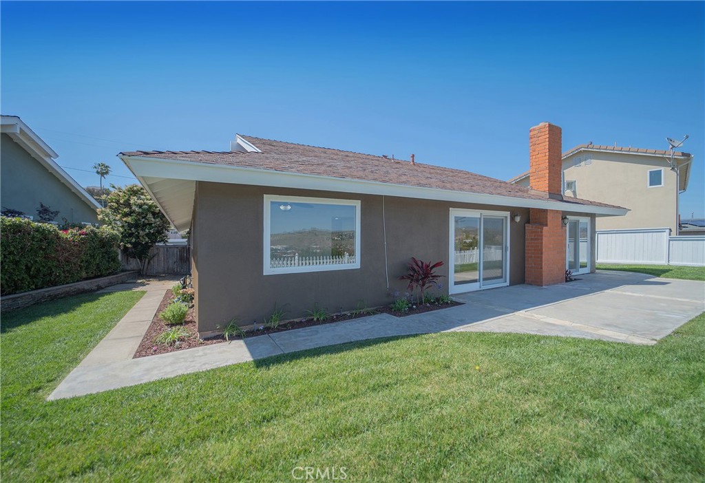25276 Barque Way Dana Point, CA 92629 - Photo 49 of 61 a front view of house with yard and green space