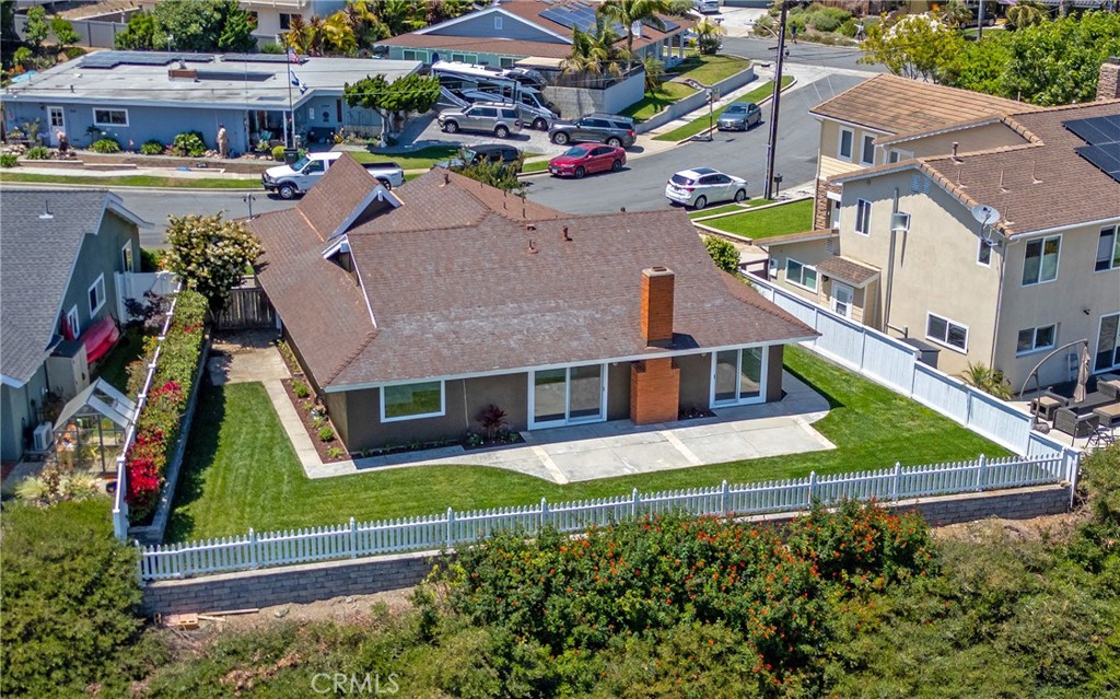 25276 Barque Way Dana Point, CA 92629 - Photo 57 of 61 an aerial view of a house with a garden and lake view