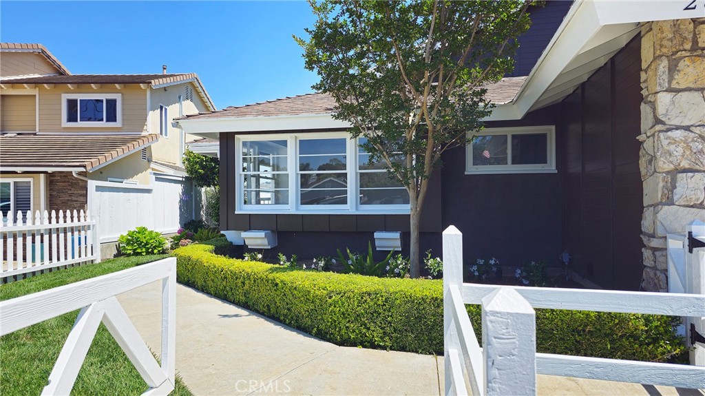 25276 Barque Way Dana Point, CA 92629 - Photo 6 of 61 a front view of a house with a yard
