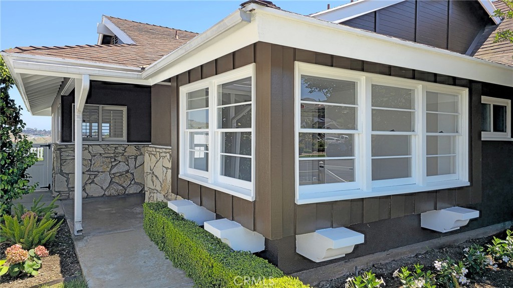 25276 Barque Way Dana Point, CA 92629 - Photo 7 of 61 a front view of a house with a yard