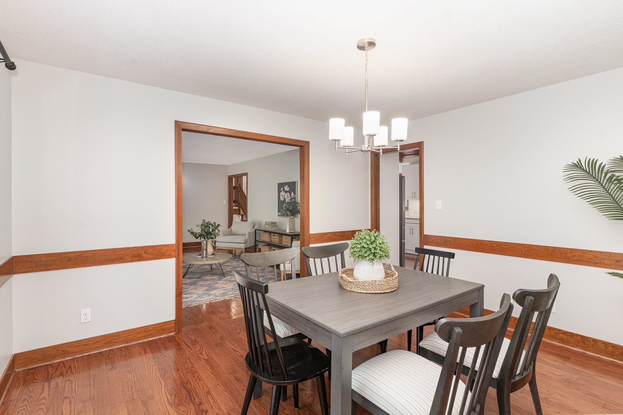 9413 Springdale Drive Raleigh, NC 27613 - Photo 10 of 24 a view of a dining room with furniture and wooden floor