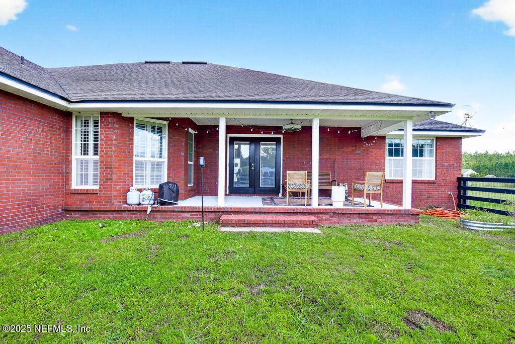 55213 Shug Road Callahan, FL 32011 - Photo 54 of 63 front view of a house with a yard