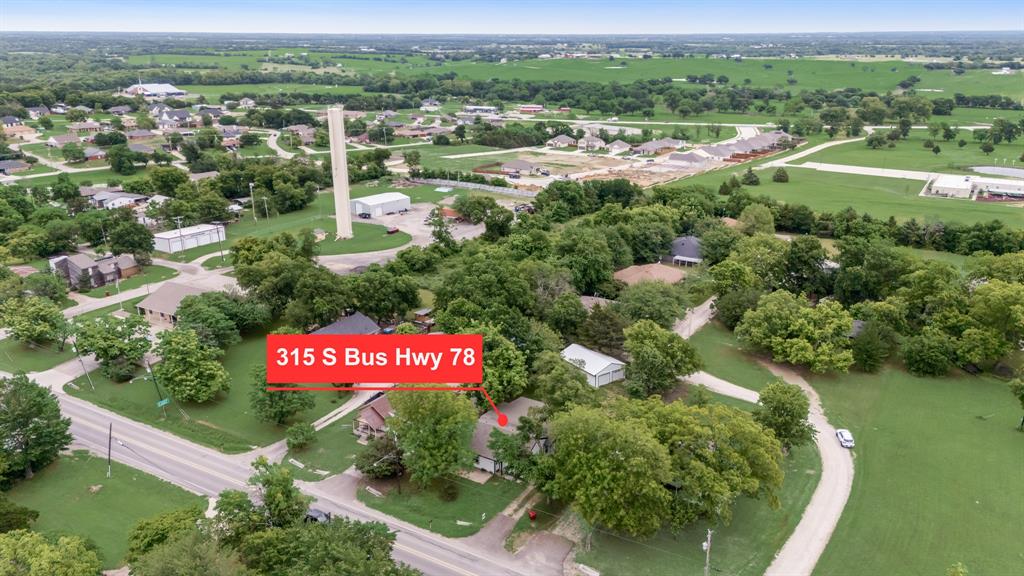 315 South Business Highway 78 Blue Ridge, TX 75424 - Photo 1 of 28 an aerial view of residential houses with outdoor space and swimming pool