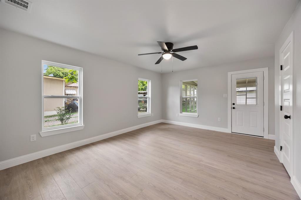 315 South Business Highway 78 Blue Ridge, TX 75424 - Photo 15 of 28 a view of empty room with wooden floor and fan
