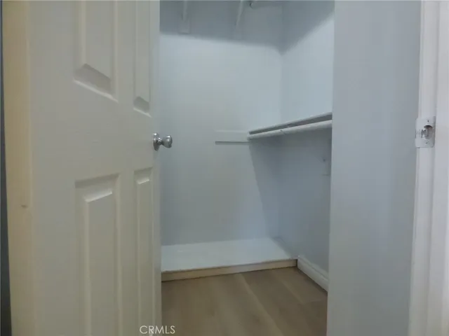 a bathroom with a shower a toilet and sink