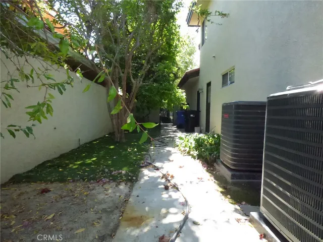 a view of a building with a patio