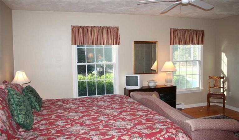 28 Seavers Road Orleans, MA 02653 - Photo 10 of 16 a bedroom with a bed and a window