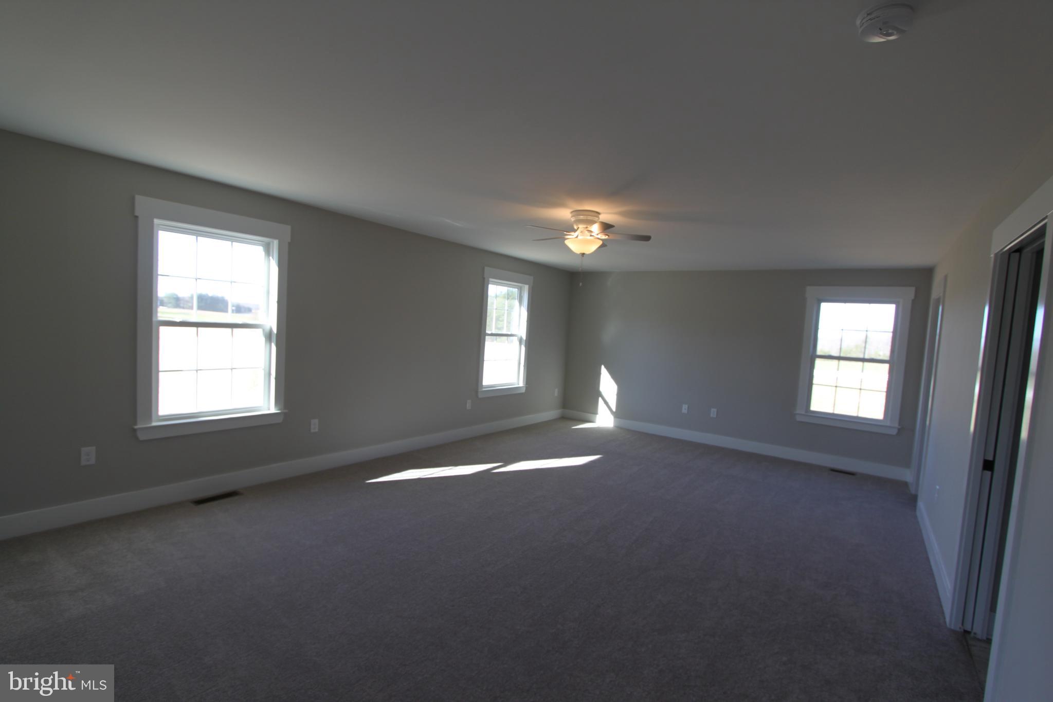 28049 Strawberry Hill Road Rhoadesville, VA 22542 - Photo 19 of 32 Spacious primary bedroom