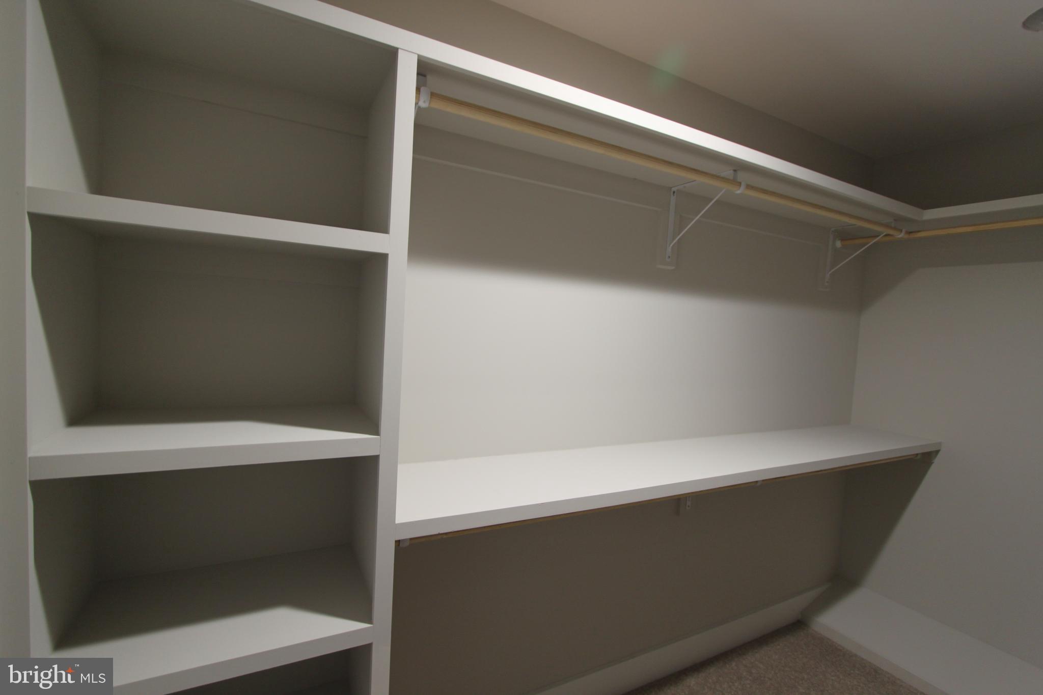 28049 Strawberry Hill Road Rhoadesville, VA 22542 - Photo 22 of 32 Primary walk in closet cubbies.
