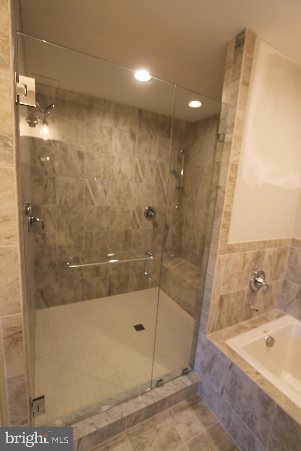 28049 Strawberry Hill Road Rhoadesville, VA 22542 - Photo 24 of 32 Primary bath shower with dual shower heads.