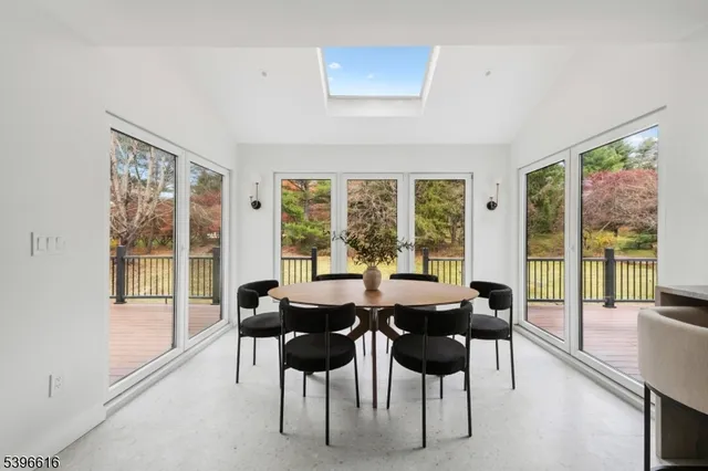 a bathroom with a double vanity sink mirror and shower