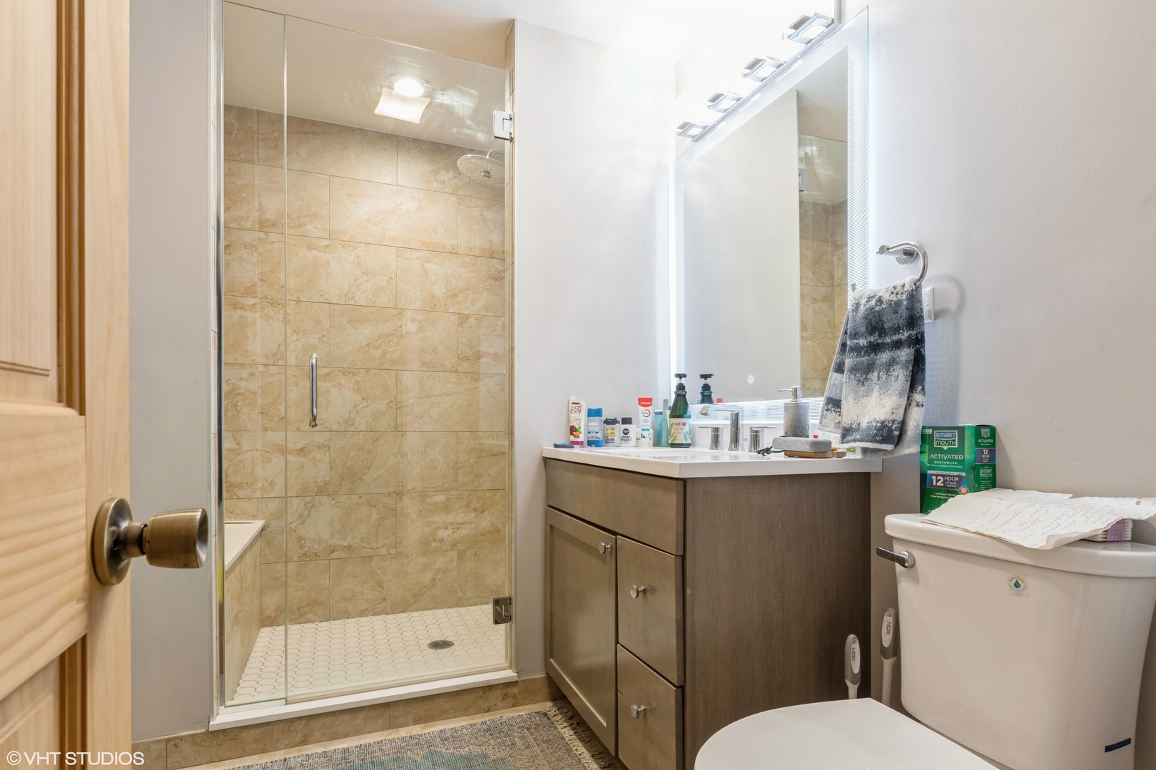 7806 South May Street Chicago, IL 60620 - Photo 16 of 20 a bathroom with a sink toilet and shower