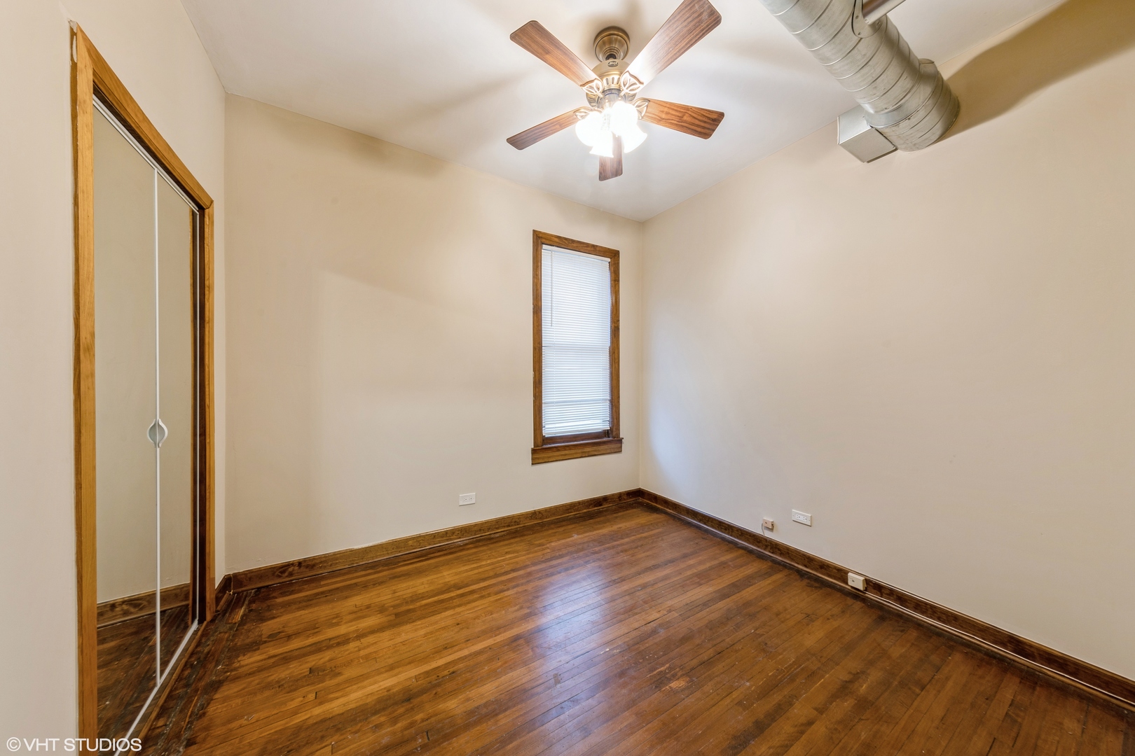 7806 South May Street Chicago, IL 60620 - Photo 9 of 20 a view of an empty room with a window