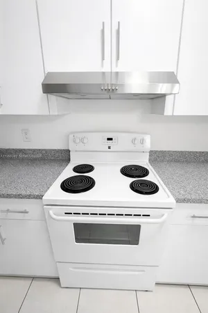 a kitchen with granite countertop a sink and a granite counter tops