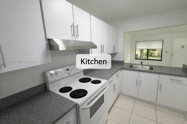 a utility room with washer and dryer