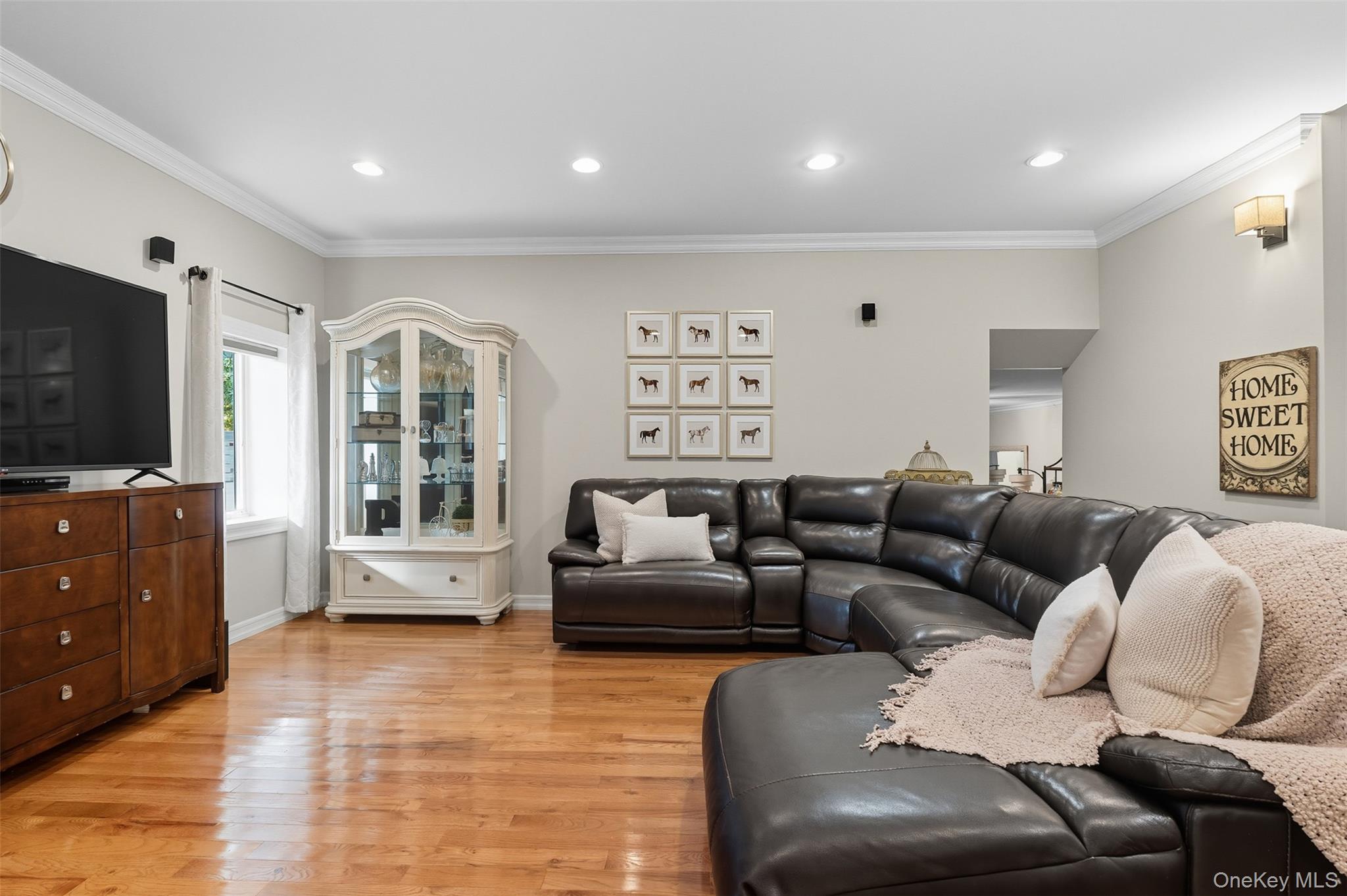 2747 Larkspur Street Yorktown Heights, NY 10598 - Photo 11 of 32 a living room with furniture window and flat screen tv
